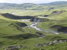 Ebene mit Geirlandsá Fluss